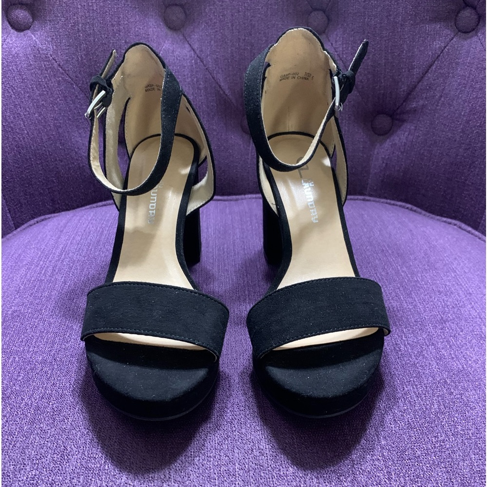 Black suede platforms, never been worn